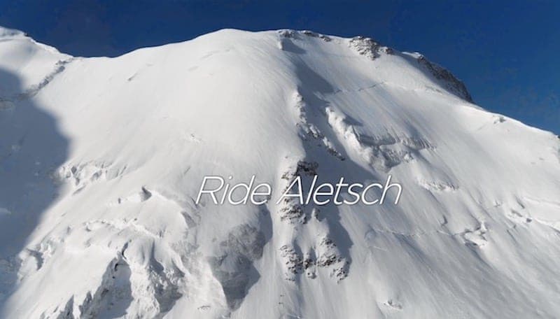 Un sommet enneigé vu du ciel, avec le texte « Ride Aletsch » en surimpression